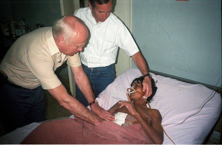 Drs. Lowell (left) and Dick (right) Furman see a patient in Honduras.