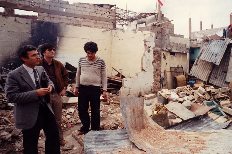Sami Dagher and Franklin Graham survey damage from the war.
