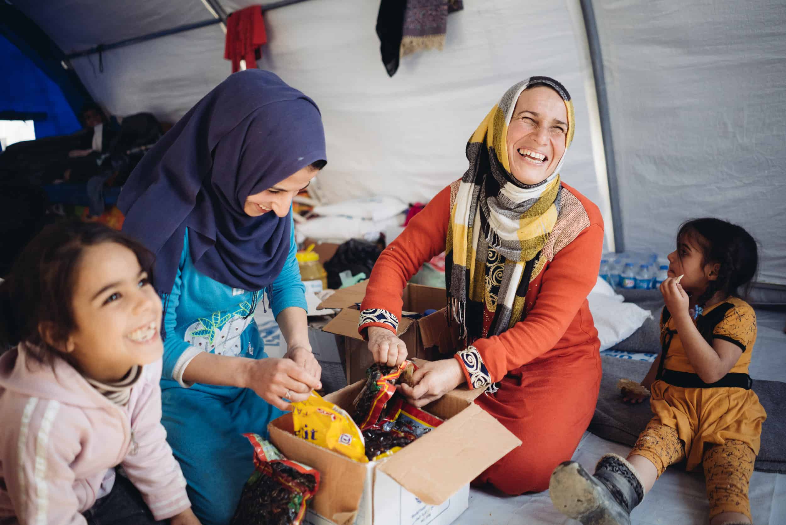 Receiving food and basic necessities brings joy to displaced families in Northern Iraq.