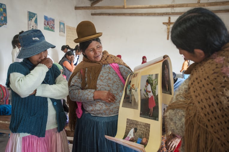Women teach other women how to facilitate the maternal and child health training.