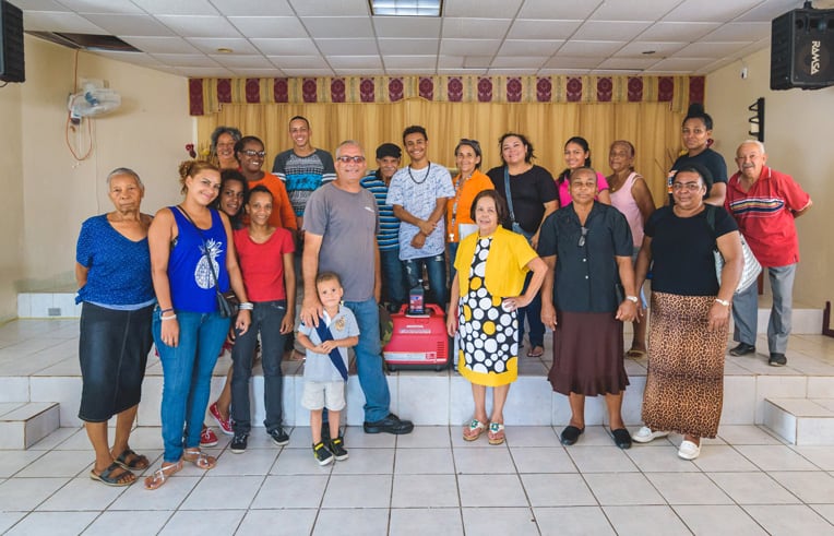 Pastor Ramona Berdomo and congregation members were grateful to receive a generator from Samaritan's Purse.