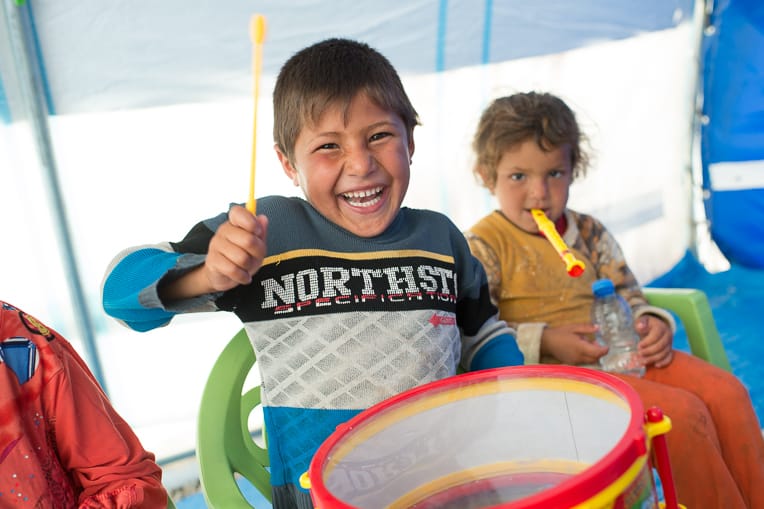 Child-Friendly Spaces in Iraq give children freedom to make noise and music and, we pray, to experience new life.