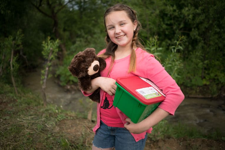 This young girl especially enjoyed the teddy bear and letter she found inside her shoebox gift. She specifically thanked shoebox packers for not forgetting about kids like her.