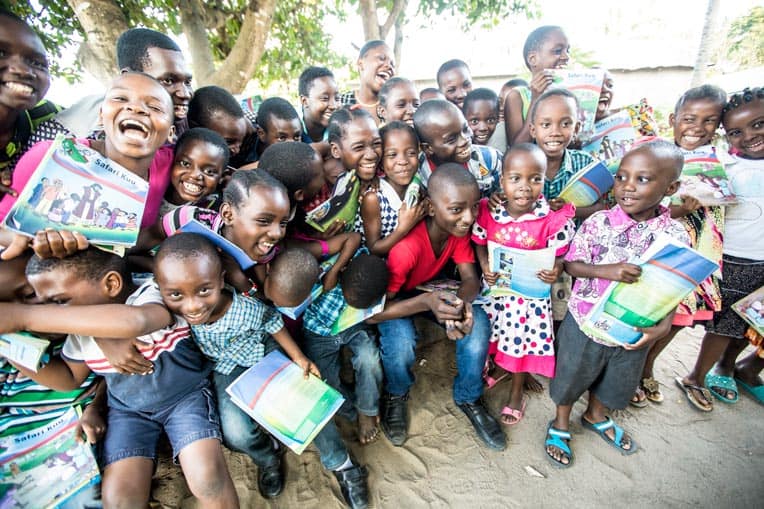 Kwale celebrates with students in The Greatest Journey class he teaches.