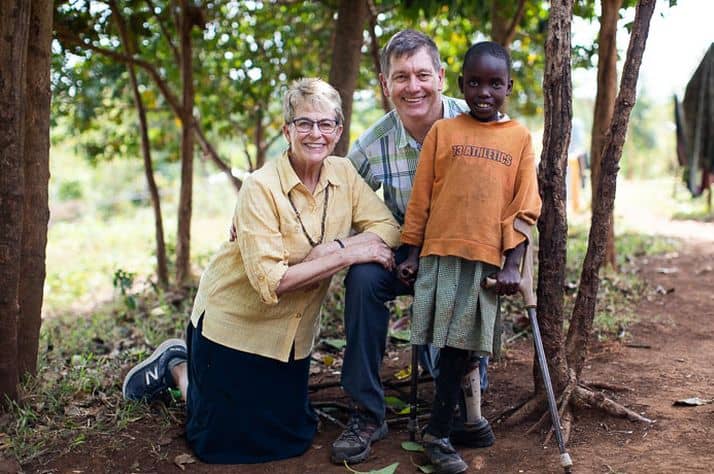 Dr. Read Vaughan and his wife Suzie with a young girl named faith, one of many children they've helped through medical ministry.