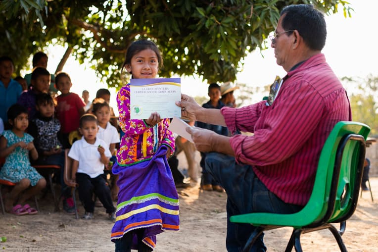 Lidia, 6, walked a mile to La Laguna to attend The Greatest Journey classes, including a graduation ceremony where she received a Bible. Her favorite verse is, “Let the little children come to Me” (Matthew 19:14).