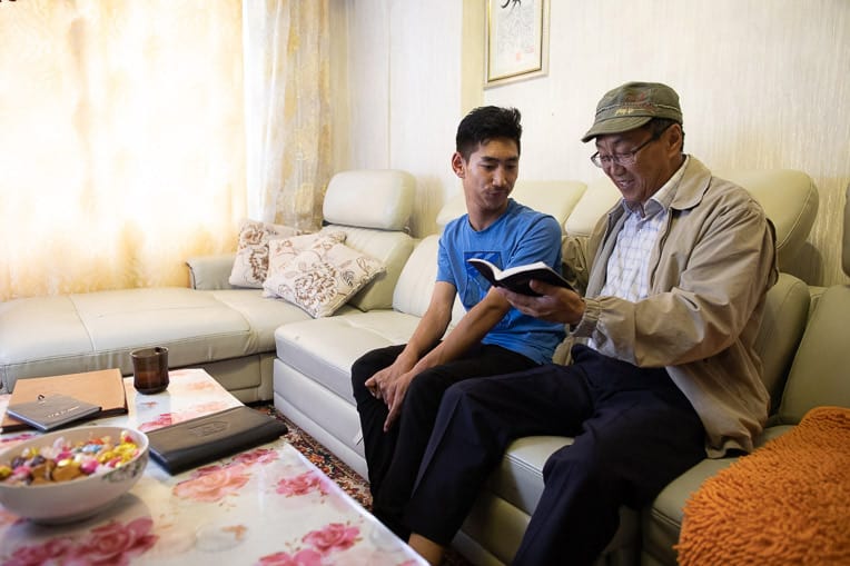 Since Chuka introduced Sampil to Christ, they often study the Bible together.