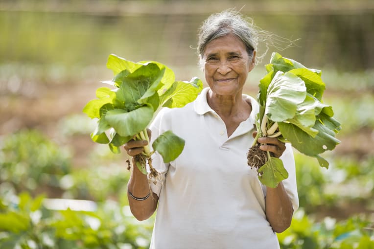 La Perisima is grateful for the extra income that comes by growing and selling vegetables.
