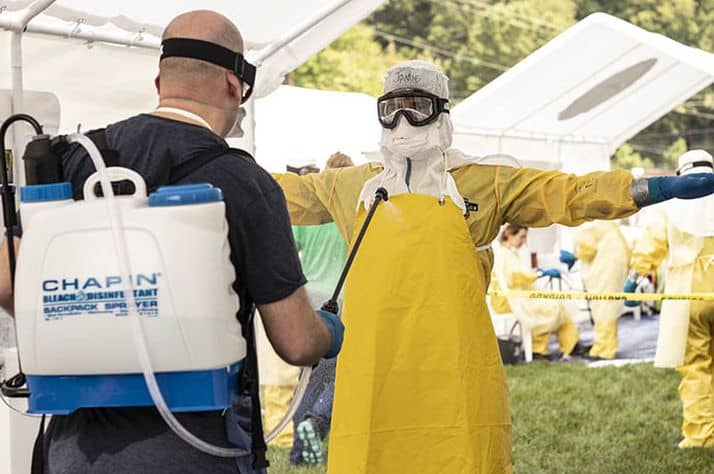 Samaritan's Purse staff members practice donning and doffing personal protective equipment at a recent Ebola preparedness training in Wilkesboro, North Carolina.