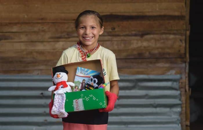 Kelly, one of 14 children from a local Colombian family, had never received gifts like these before.