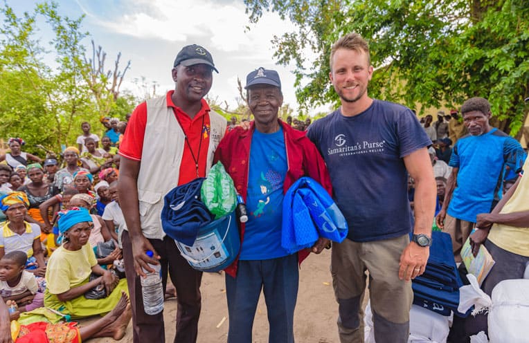 Chief leader Matacipo (center) prayed for God to send help to his village.</p></div> <p>“It is too difficult to mention our big need because we have lost many things—our houses, our chickens, and our cows. Everything we had, we lost,” Matacipo said.