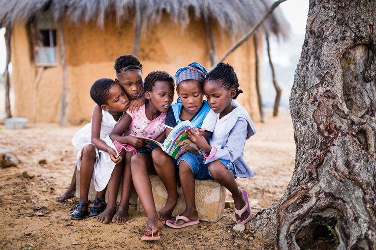 Agnes' siblings and other children in Serinane are experiencing the life changing truth of God's Word through The Greatest Journey.