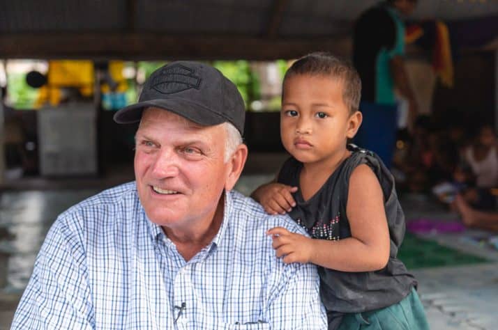 Samaritan's Purse President Franklin Graham meets one of many grateful children on Tarawa during his visit to Kiribati. As part of a new initiative, Operation Christmas Child is focused on reaching the children of 1,000 Pacific islands.