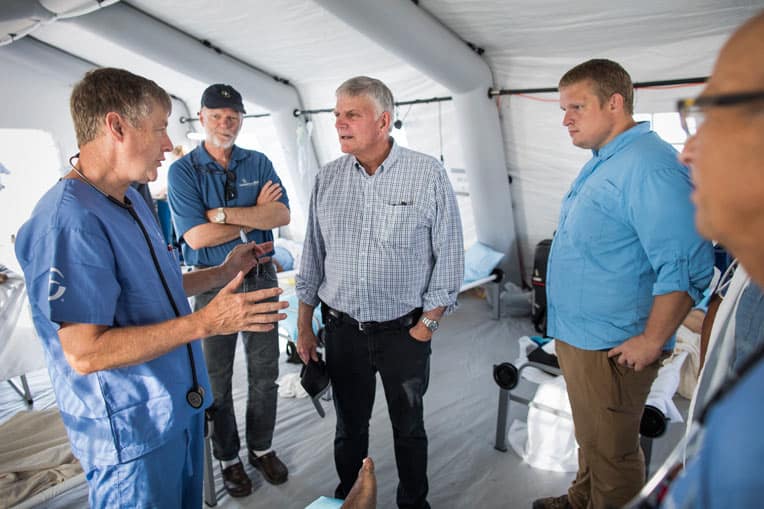 Franklin Graham speaks with our medical team in Freeport, Grand Bahama. We've already seen hundreds of patients at our field hospital.