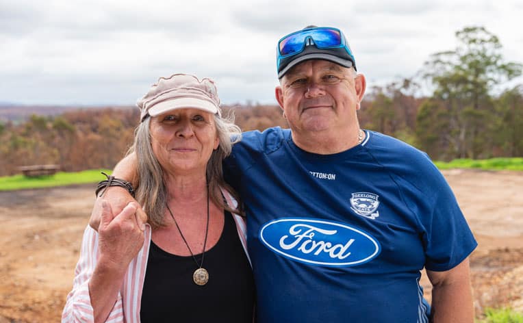 Terry Maki and his partner Patricia experienced God's love through the many volunteers who helped them sift through the ashes of their home.