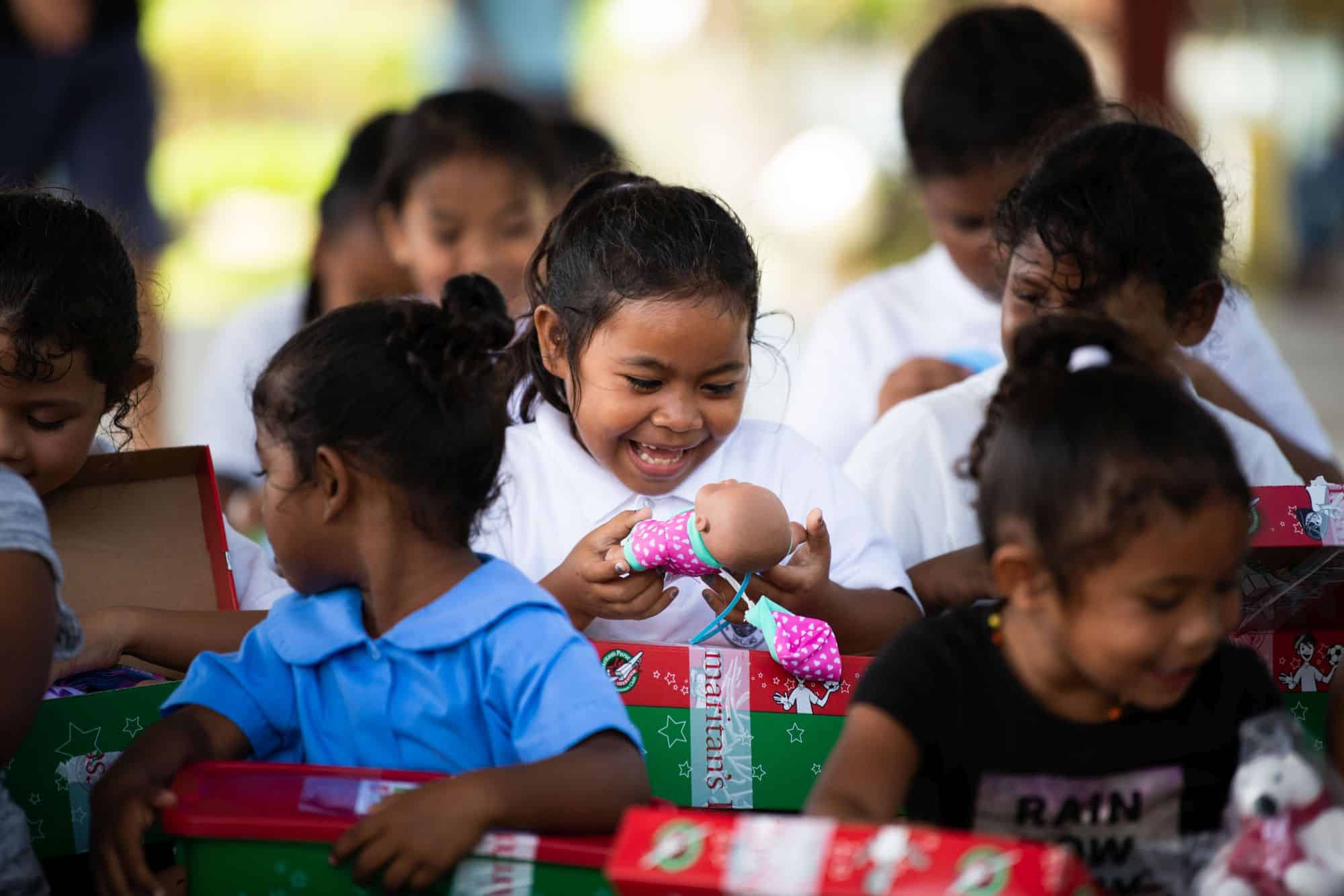 Joy erupts in children at Peleliu Elementary School when they receive their Operation Christmas Child shoebox gifts.