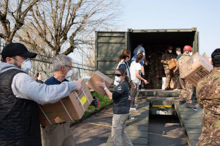 Our team unloads medical equipment that was transported by our DC-8 aircraft.