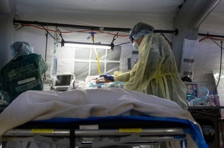 A tender moment caring for a critically ill patient.
