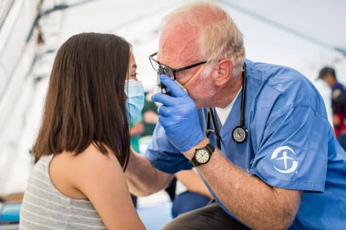 Dr. Mark Agness cares for a patient at the Samaritan's Purse Emergency Field Hospital in San Pedro Sula, Honduras.