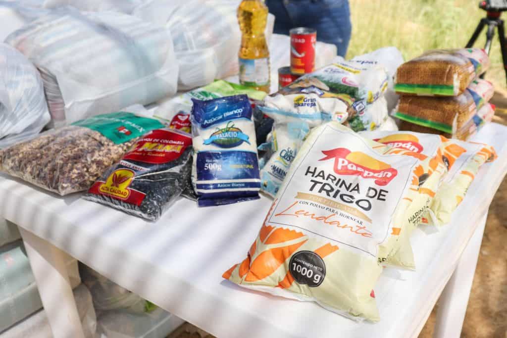 Packages of dried soup, beans, flour, salt, sugar, and oil are a lifeline for hungry Venezuelan families.