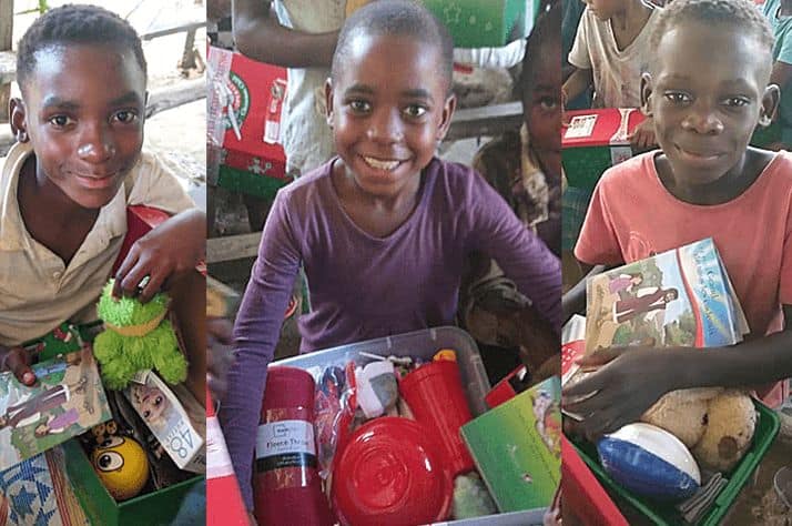 Baka children in Gabon proudly show off the new treasures they received in their Operation Christmas Child shoebox gifts.