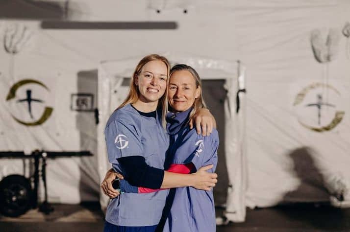 Tricia, right, and Ebony, a mother and daughter from Australia, deployed together to serve at our Emergency Field Hospital in Lviv, Ukraine.