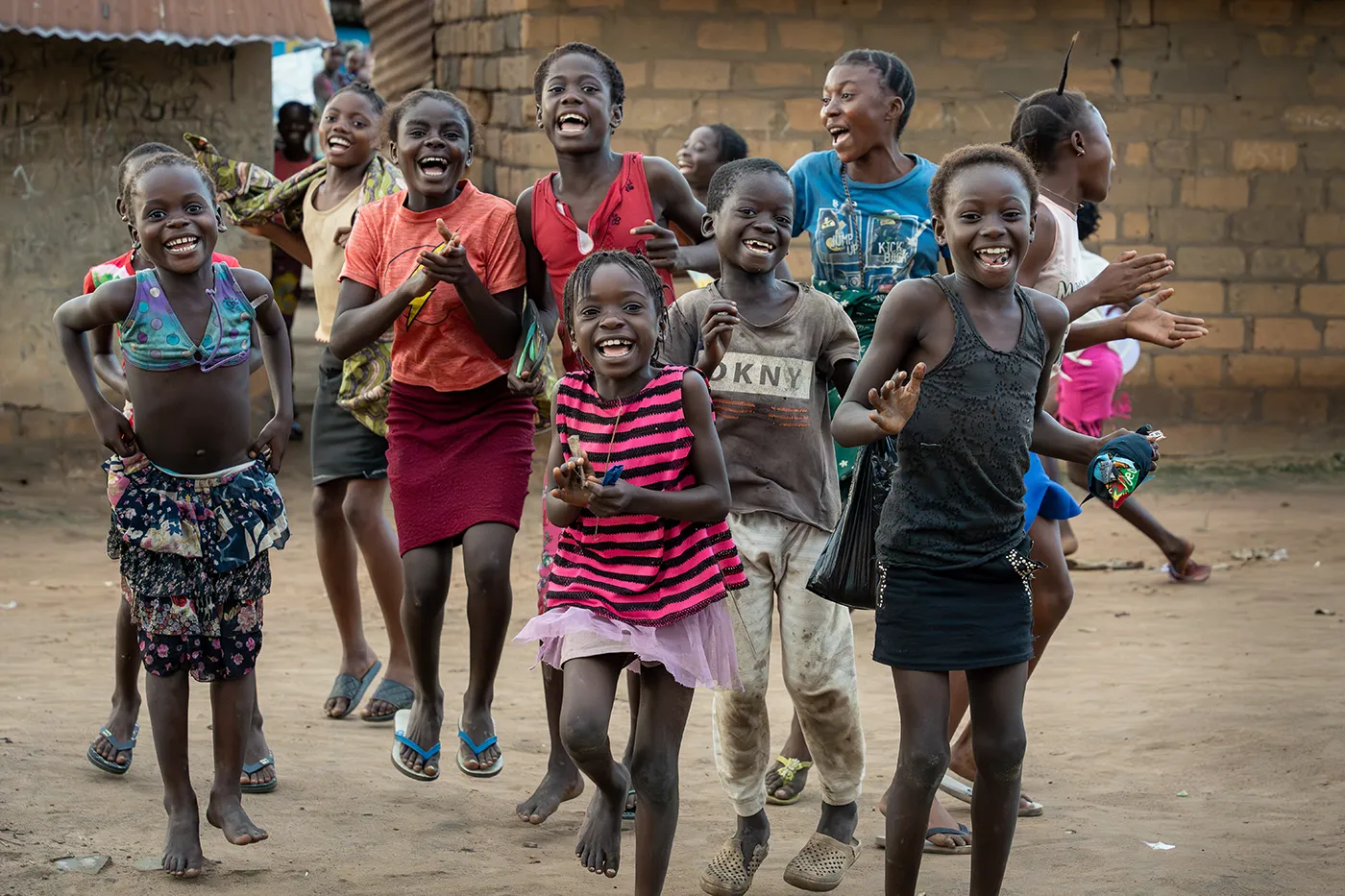 Dorcas playing with classmates in the Democratic Republic of the Congo after receiving safe water at school.