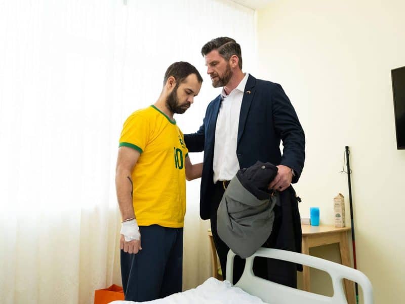 Edward Graham, chief operating officer for Samaritan’s Purse and a former U.S. Army Ranger, prays with a wounded Ukrainian soldier.