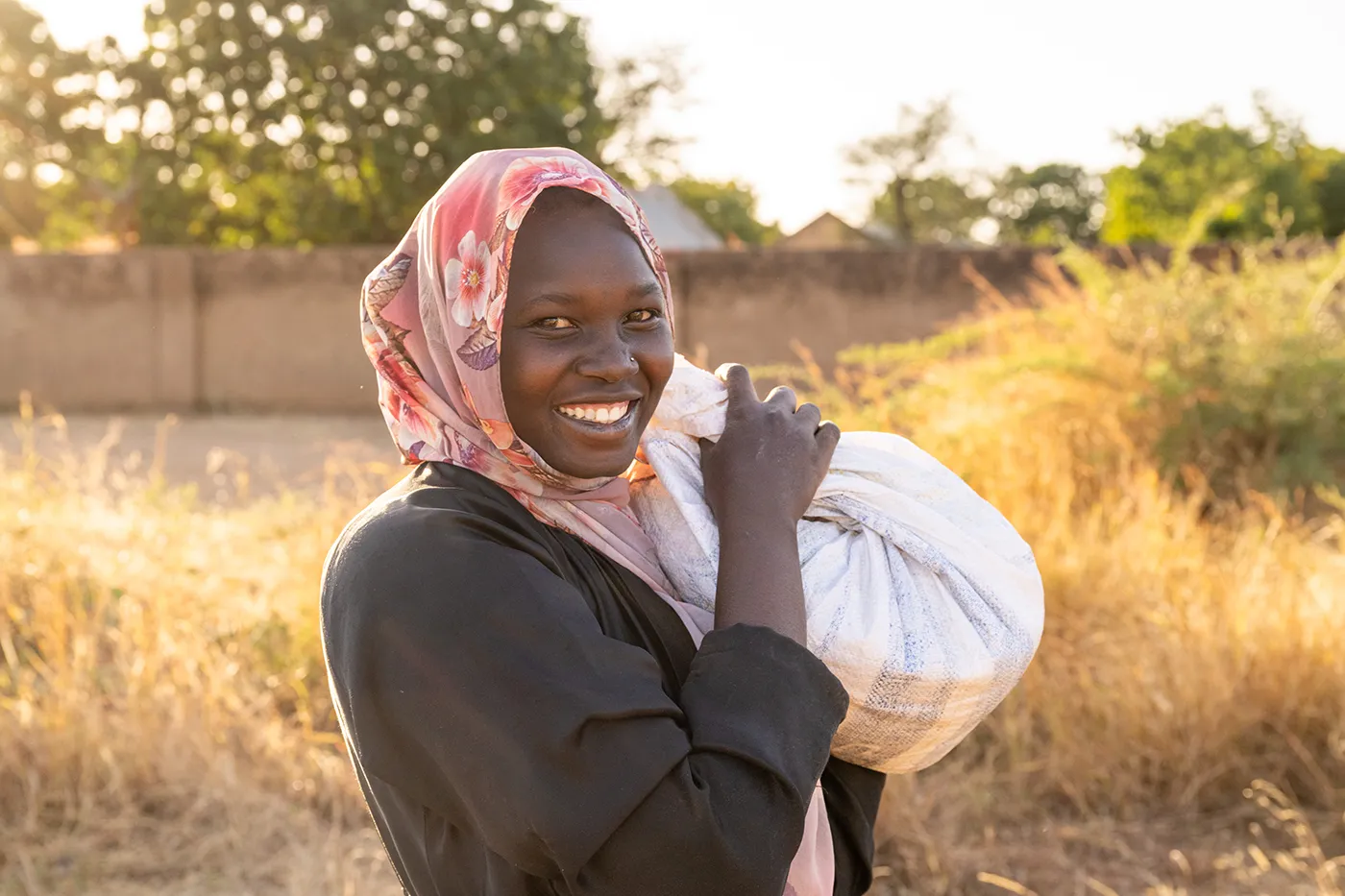 Children and families in a community supported by food projects, agriculture training, and Gospel-centered care.