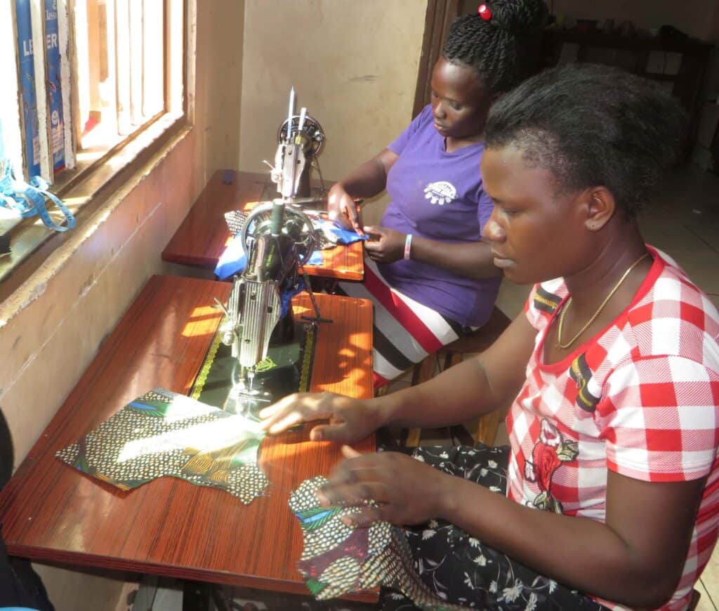 Mirembe is building her skills as a tailor—a key skill to help her earn a sustainable income. 