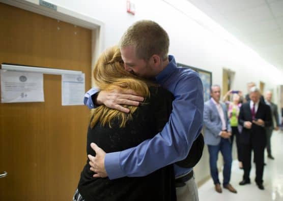 Dr. Kent Brantly hugging wife