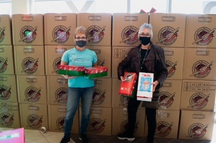 Lori Bettig and Barbara Shumeley at Grant Memorial Church after Shumeley dropped off over 800 boxes. (Supplied)