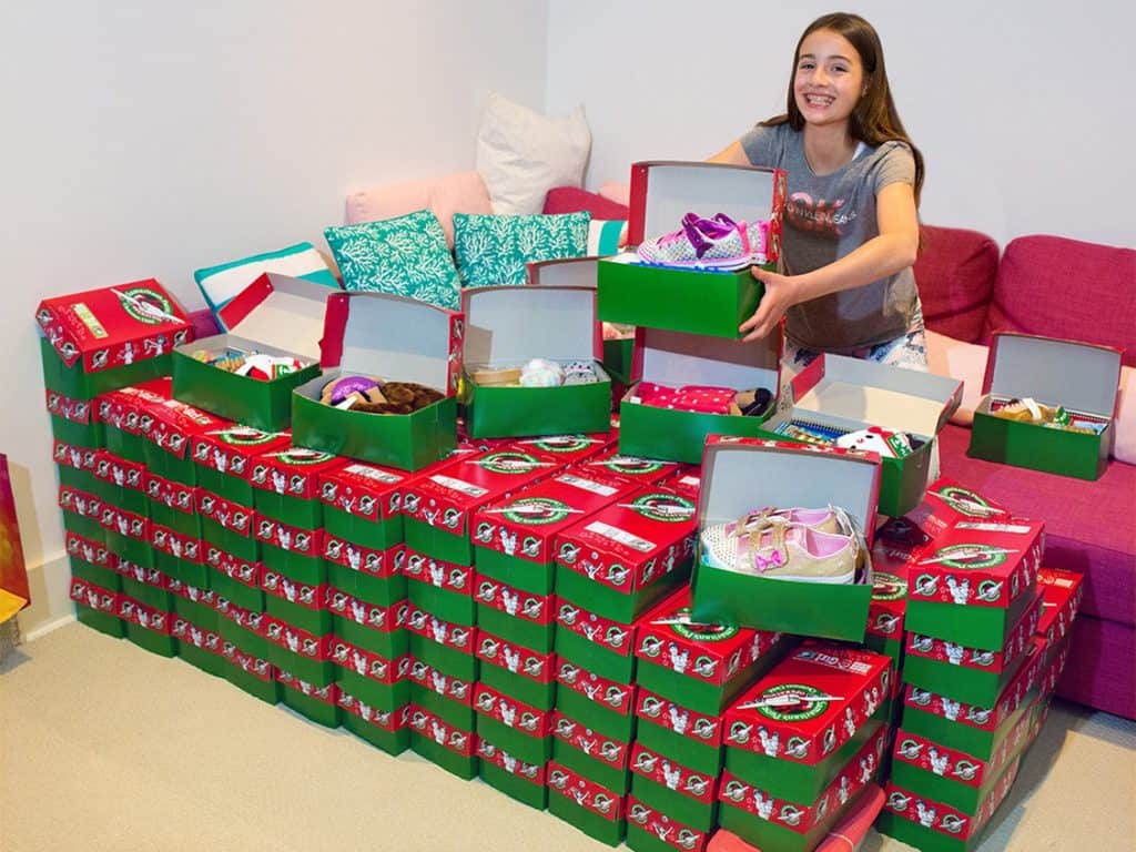 Salem Keogh packs life-changing shoeboxes filled with school supplies, toys, clothing and hygiene items as part of the Samaritan’s Purse Christmas Shoe Box campaign at her home on Monday, November 16, 2020. Salem had the idea for her family to pack 10,000 boxes on her 7th birthday, now six years later the family is closing in on that goal having packed 1,200 boxes this year alone. PHOTO BY GAVIN YOUNG/POSTMEDIA