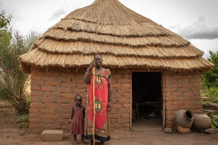 Following a tragic fire, a local church helped Abuk and her children in part by building them this home.