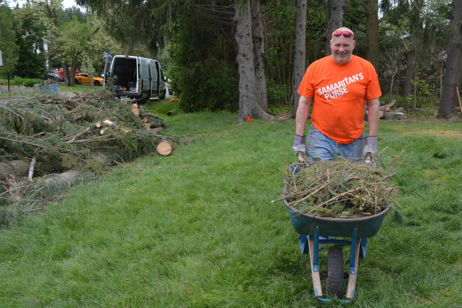 Volunteer teams in Ottawa are helping to remove fallen trees, clean up debris from homes, and help patch damaged roofs and windows as needed.