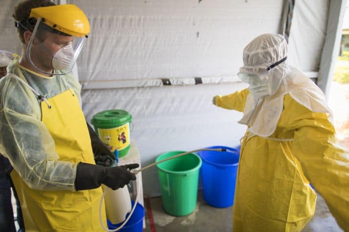 Staff are sprayed with a chlorine solution every time they remove personal protective equipment.