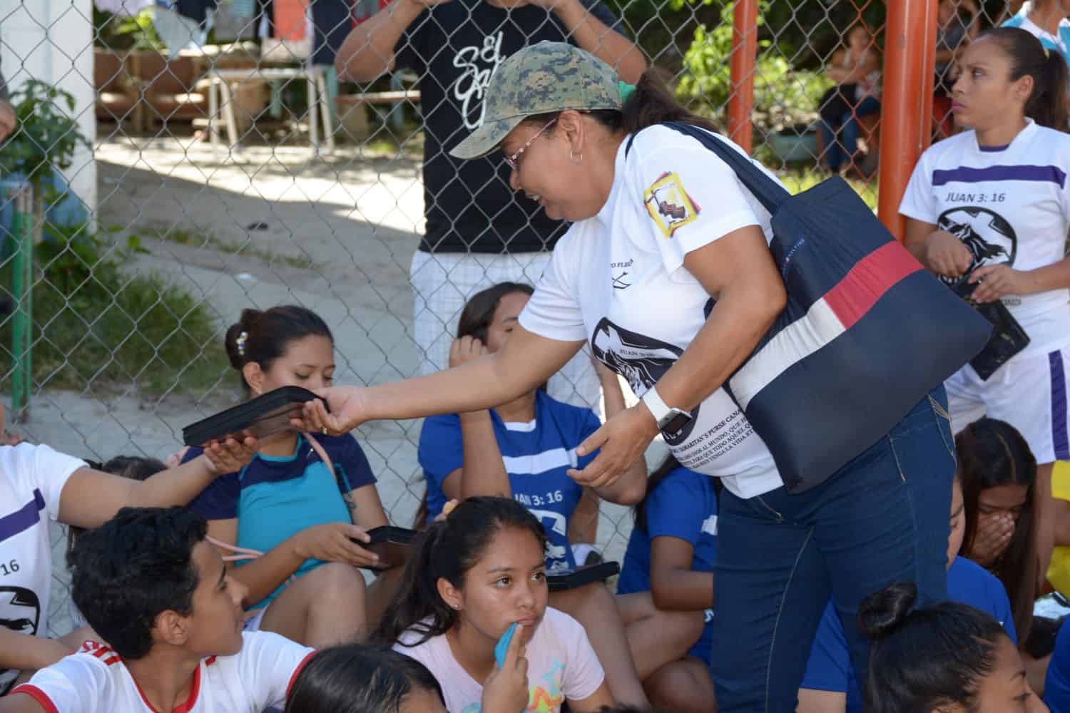 None of these young soccer players turned down an opportunity to own a Spanish New Testament.