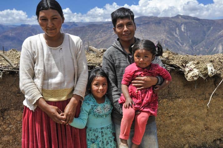 Margarita, Noelia, Abraham, and Karen at their mountaintop home in Chuma, Bolivia.