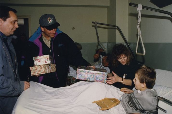Franklin Graham delivers shoeboxes with Mary Damron in Eastern Europe.