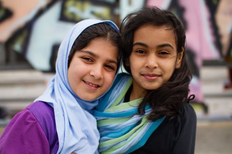 Afghan girls who became friends while living in a refugee camp in Greece.