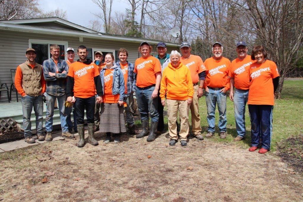 Samaritan's Purse volunteers gather during flood relief work in Fredericton.