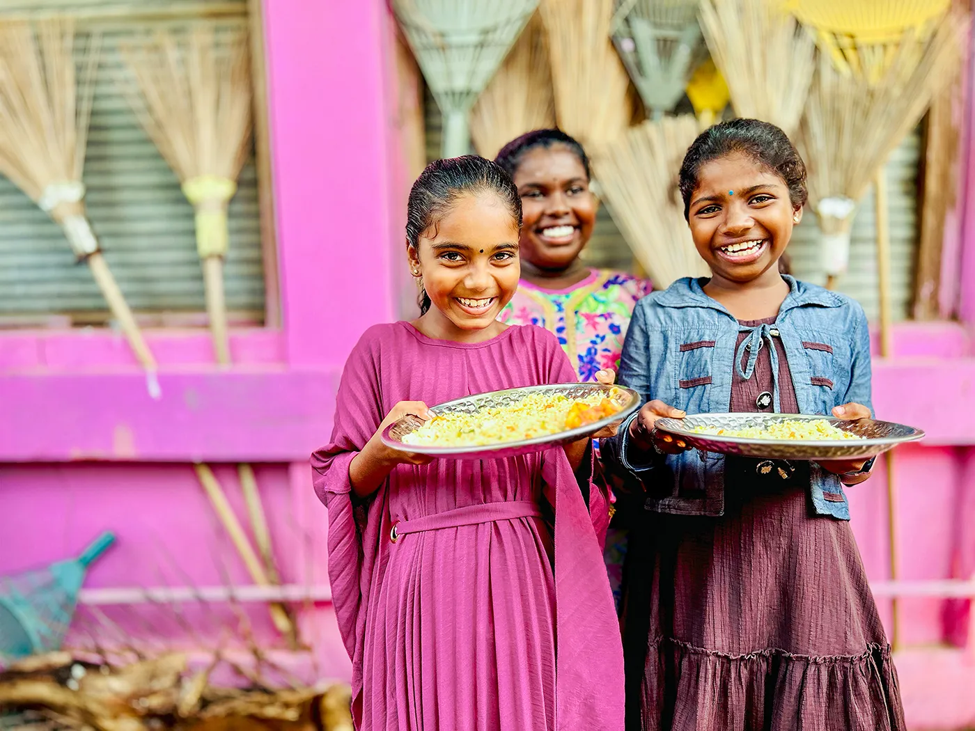 Children and families in a community supported by food projects, agriculture training, and Gospel-centered care.