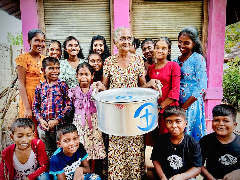 A group of people receiving aid.
