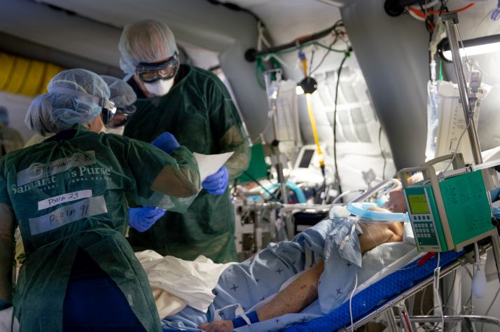 Medical staff tend to COVID-19 patients at the Samaritan’s Purse emergency field hospital in Cremona, Italy