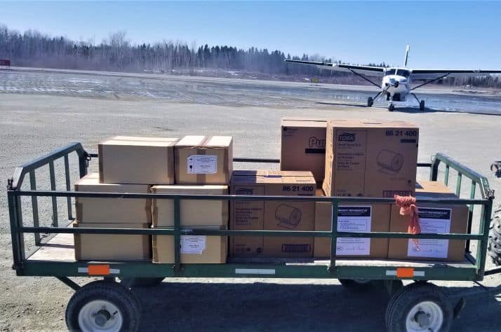 Personal Protective Equipment is delivered to an airport in northern Canada, ready for distribution to health care workers and emergency first responders in remote First Nations communities.
