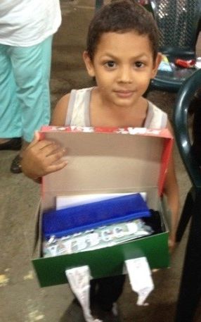 Adrian loved receiving the toys that were in his shoebox.