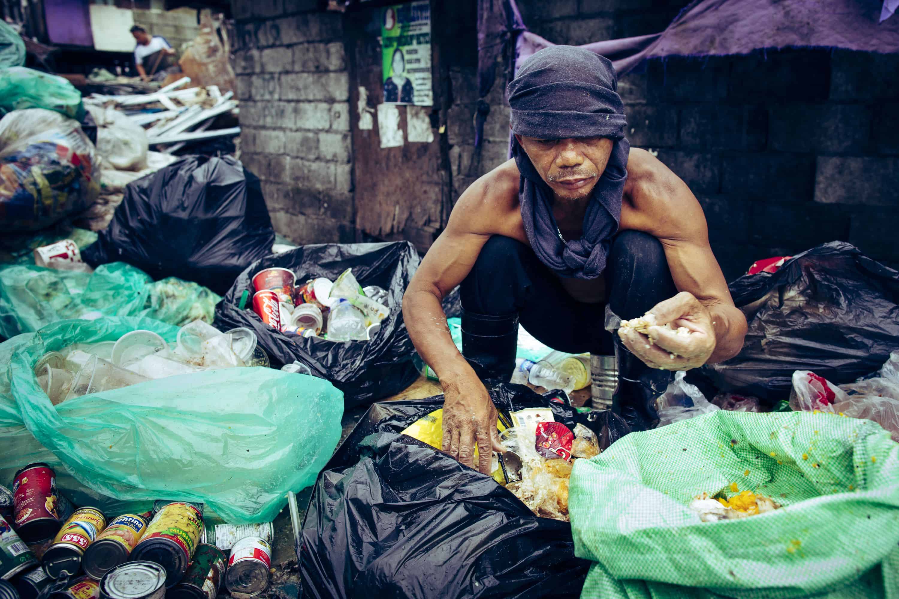 Scavenging for already-eaten food that can be recooked and sold is a common source of income in Tondo.