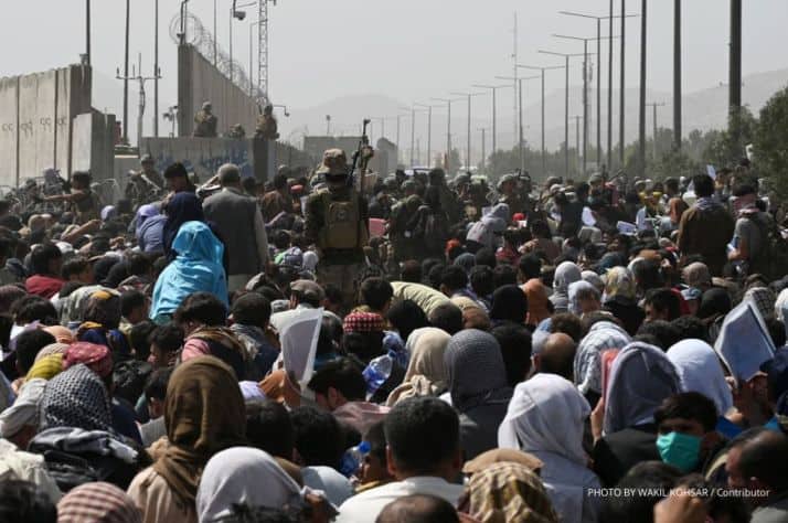 Crowds of desperate people are looking to flee Afghanistan. (Photo by WAKIL KOHSAR/AFP via Getty Images)