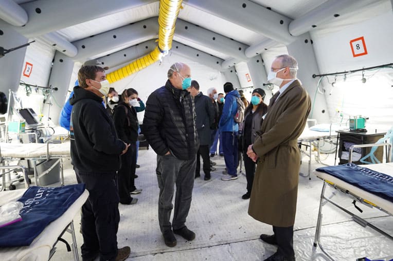 Dr. David Reich (right), tours our field hospital with Samaritan’s Purse staff Ken Isaacs (middle), Vice President of Programs and Government Relations.