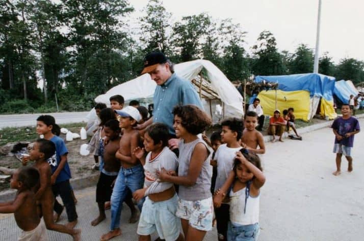 Franklin Graham encourages some of the children who suffered through Hurricane Mitch.